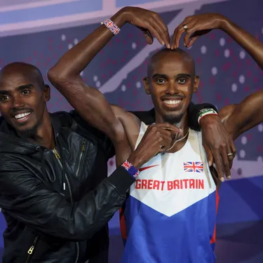 Mo Farah hugging his own figure